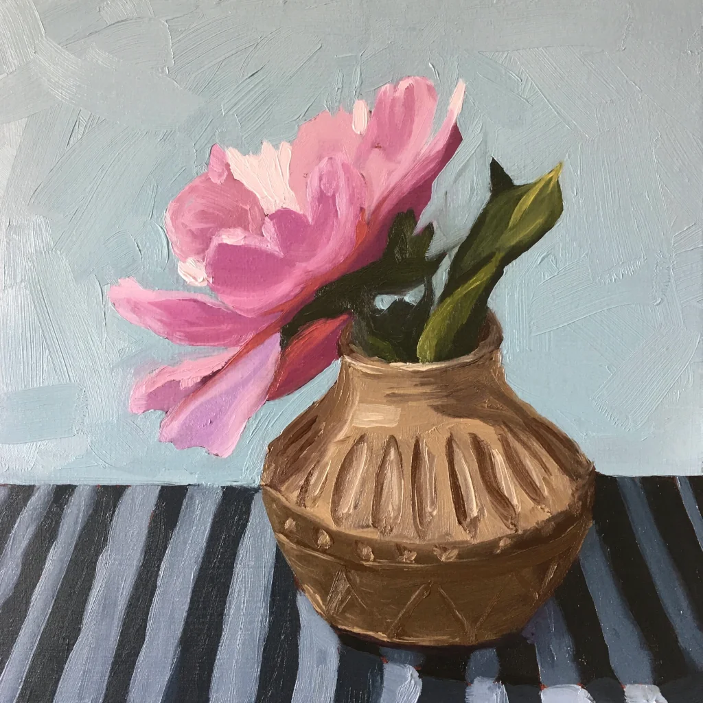 Oil painting of a single, pink peony flower in a small, brown vase sitting on a striped cloth.