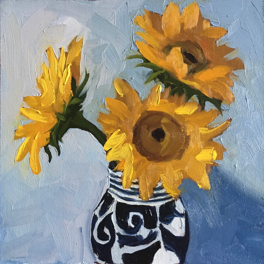 Oil painting of three sunflowers in a blue and white vase.